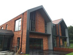 Commercial box gutter and square downpipe installation
